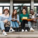 Multi ethnic group of Latin and African American college students smiling - Diversity Portrait